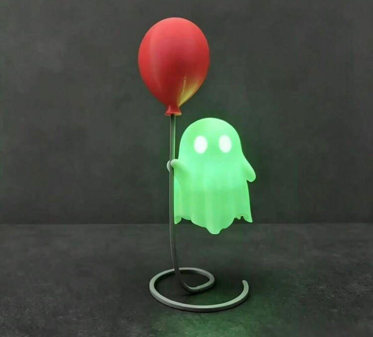 Glow in the Dark Ghost Holding Red Balloon Figurine
