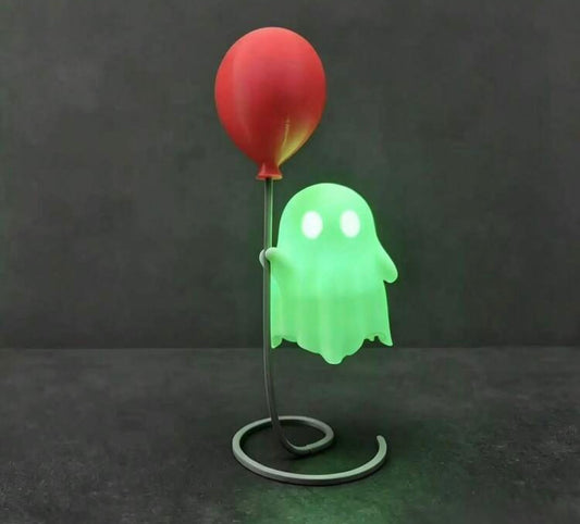 Glow in the Dark Ghost Holding Red Balloon Figurine