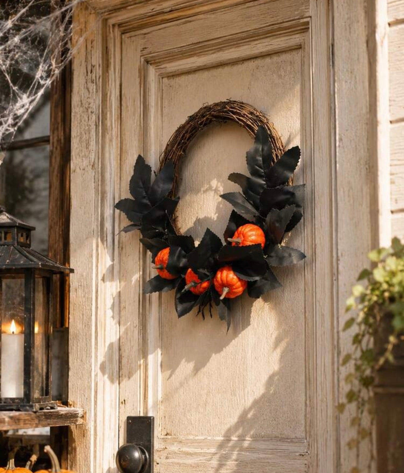 Black Foliage & Orange Pumpkin Grapevine Wreath