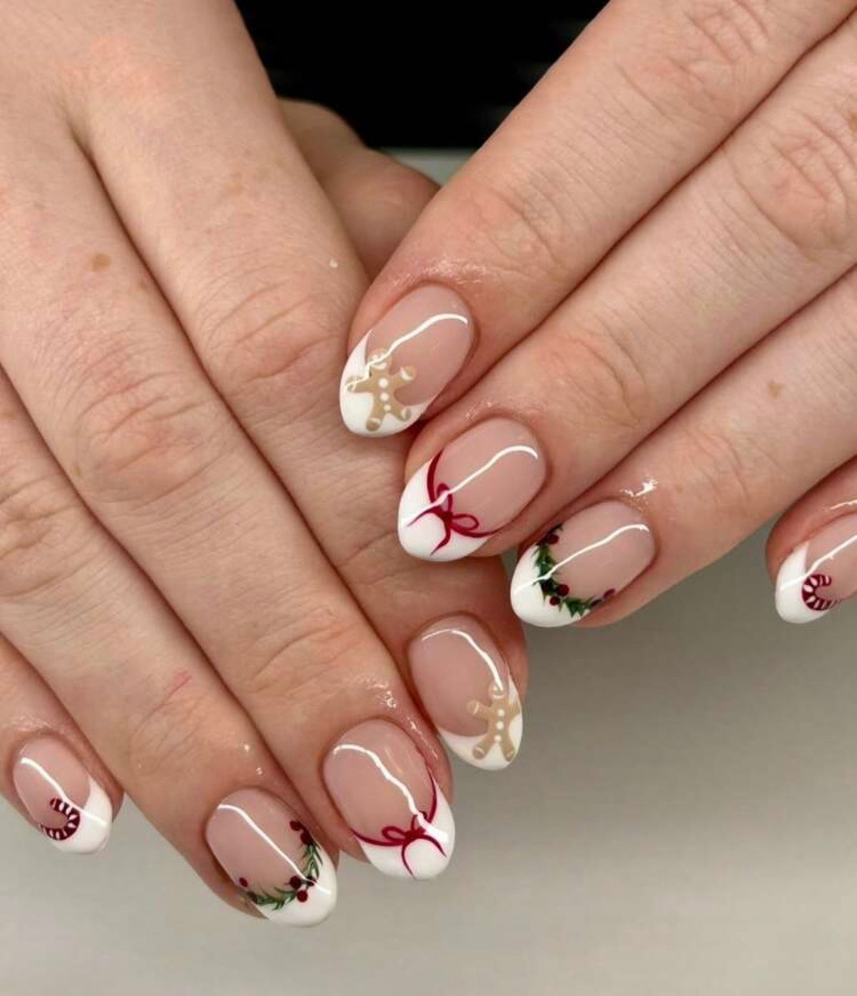 Festive Holiday French Tip Almond Nails